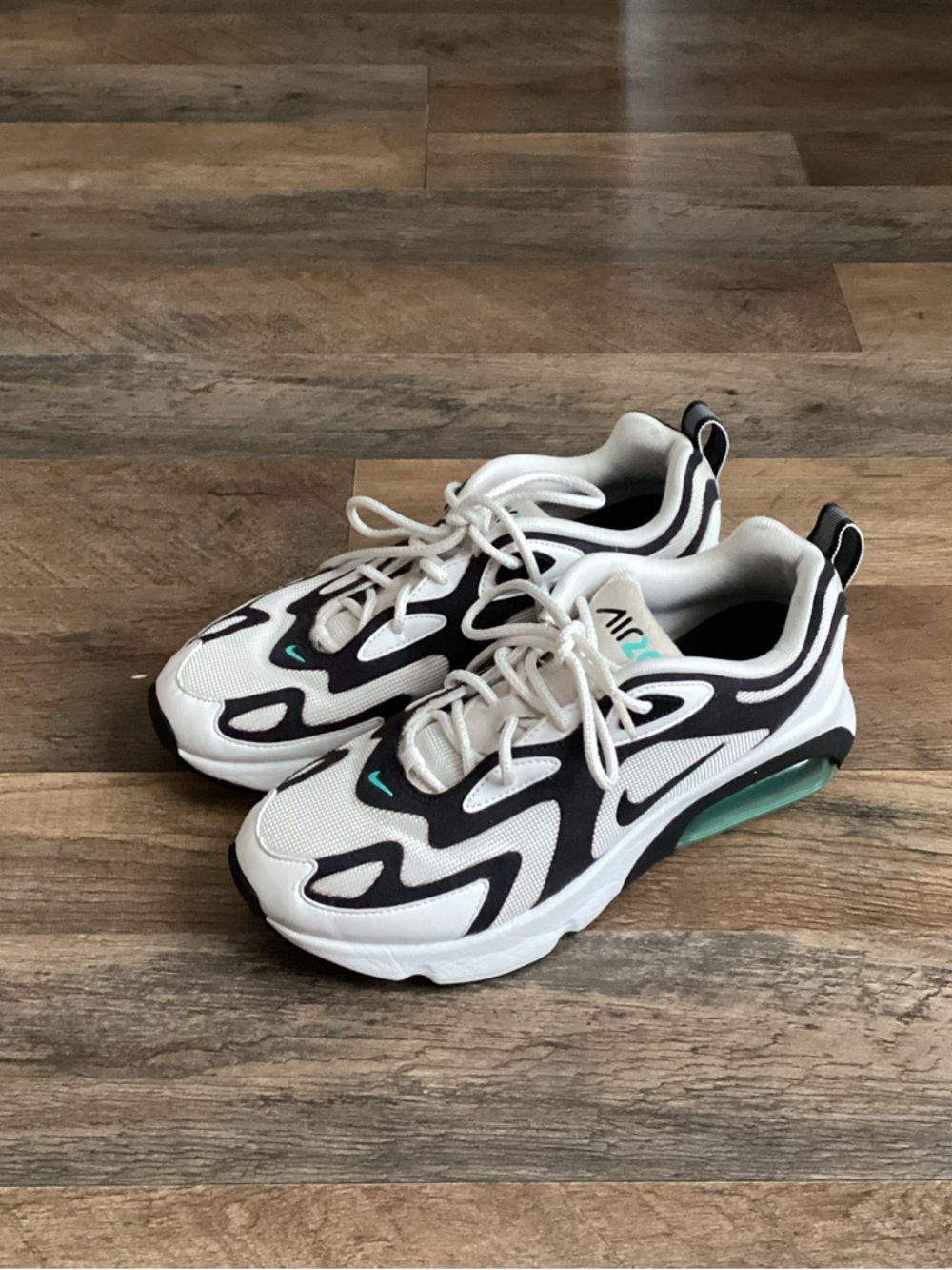 Nike AirMax White and Black Sneakers with Teal Accent